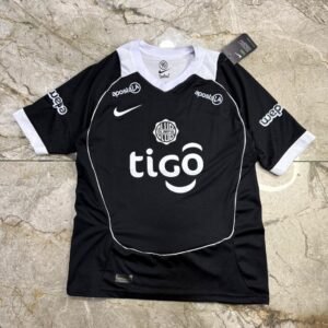 Camiseta Olimpia 2026 total 90